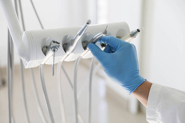 Professional Tooth Extraction technician working in Omaha, NE